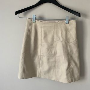 Pleated off white leather mini skirt. Size US 2.